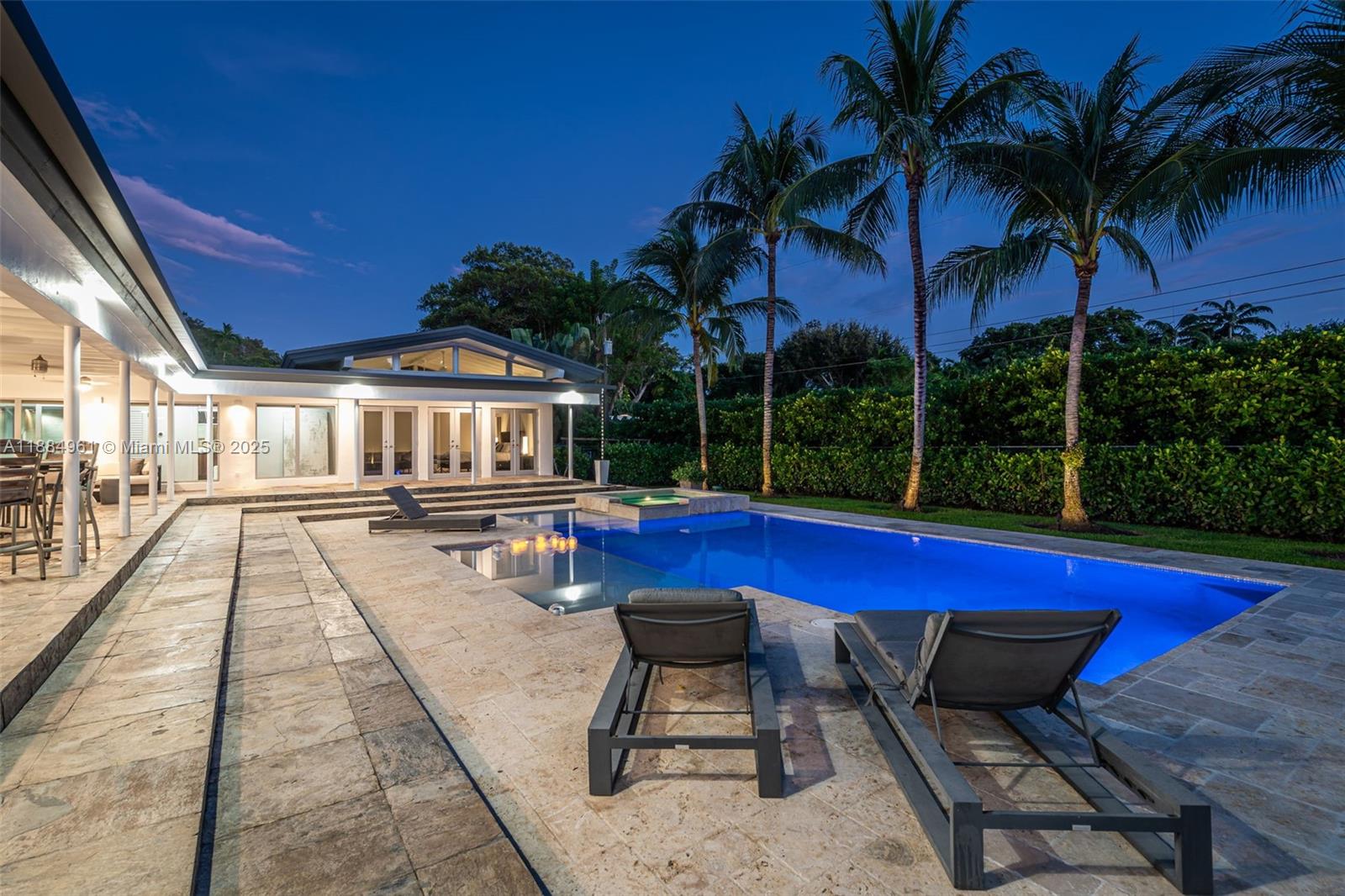 7550 Southwest 60th Street Miami, FL 33143 - Photo 57 of 64 a swimming pool with outdoor seating and yard