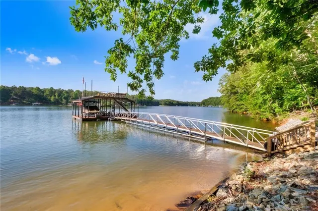 a view of a balcony with chairs
