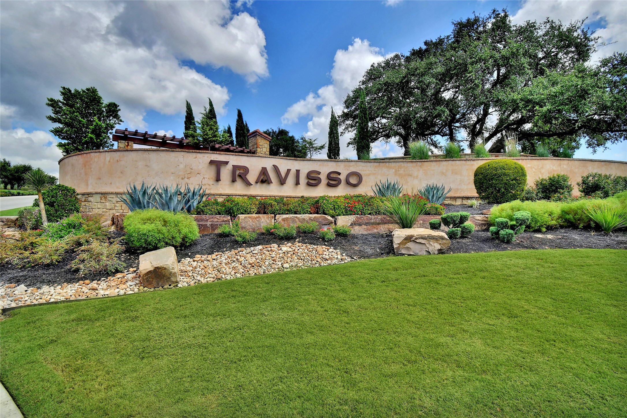 4124 Florentine Road Leander, TX 78641 - Photo 3 of 37 Community / neighborhood sign with a lawn
