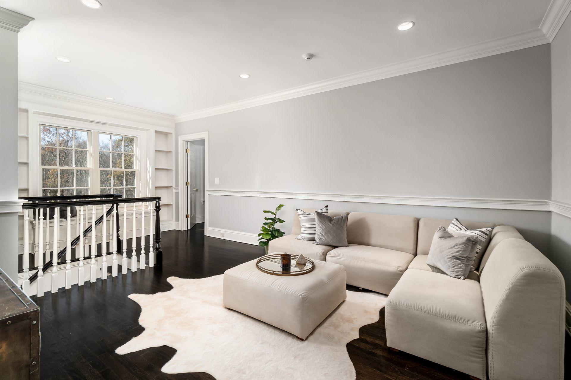 494 Ponus Ridge Road New Canaan, CT 06840 - Photo 19 of 30 a living room with furniture and wooden floor