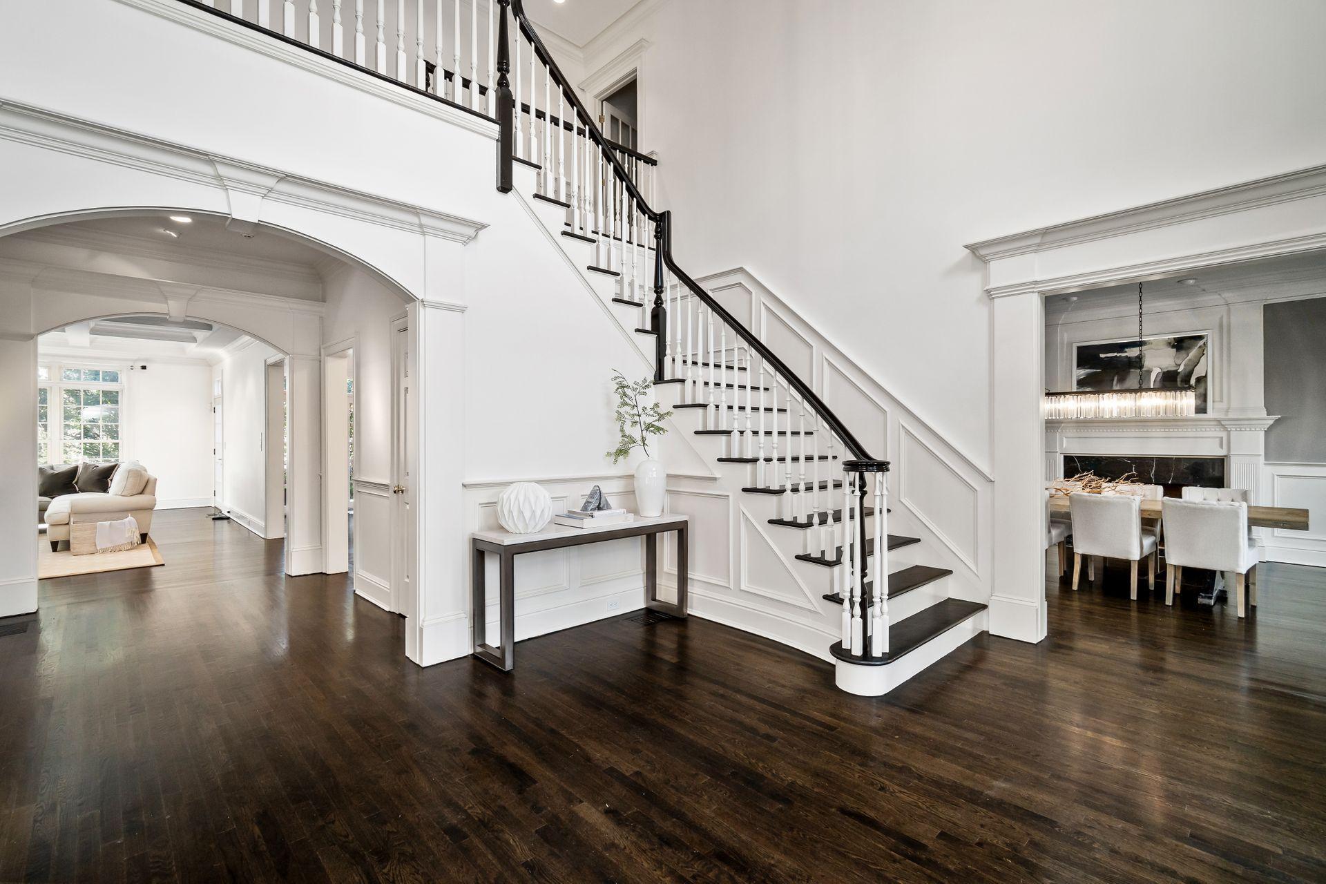494 Ponus Ridge Road New Canaan, CT 06840 - Photo 3 of 30 a view of entryway and hall with wooden floor