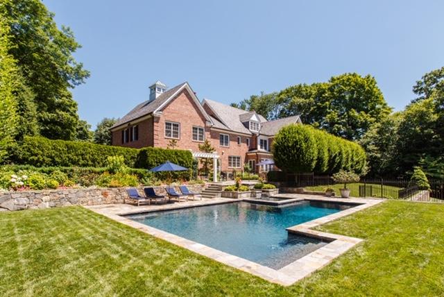 494 Ponus Ridge Road New Canaan, CT 06840 - Photo 28 of 30 a view of a house with pool and sitting area