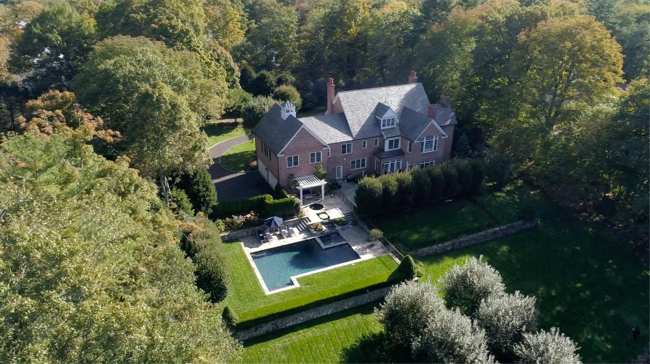 494 Ponus Ridge Road New Canaan, CT 06840 - Photo 29 of 30 an aerial view of a house with a garden
