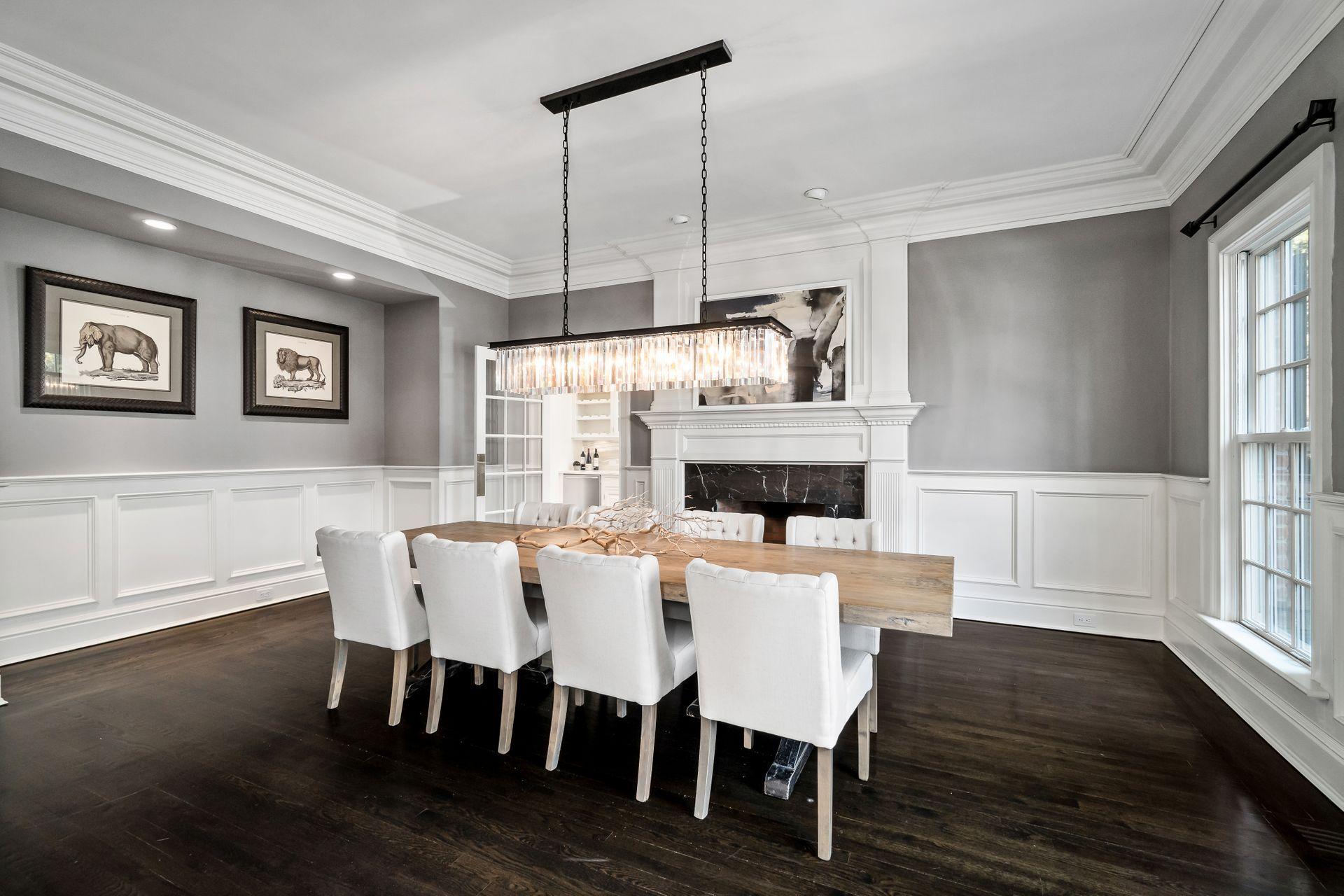 494 Ponus Ridge Road New Canaan, CT 06840 - Photo 6 of 30 a view of a dining room with furniture window and wooden floor