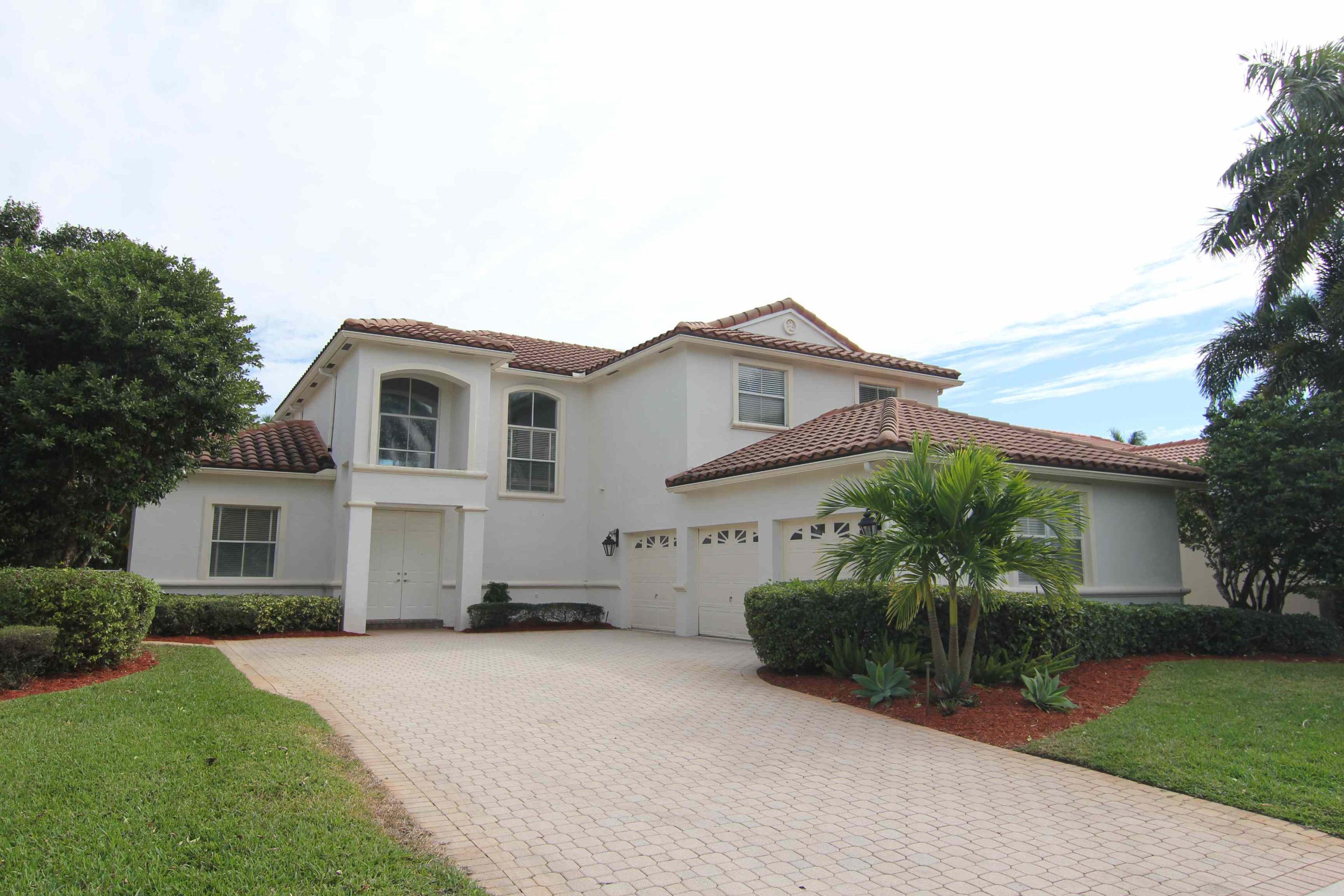 a house view with a garden space