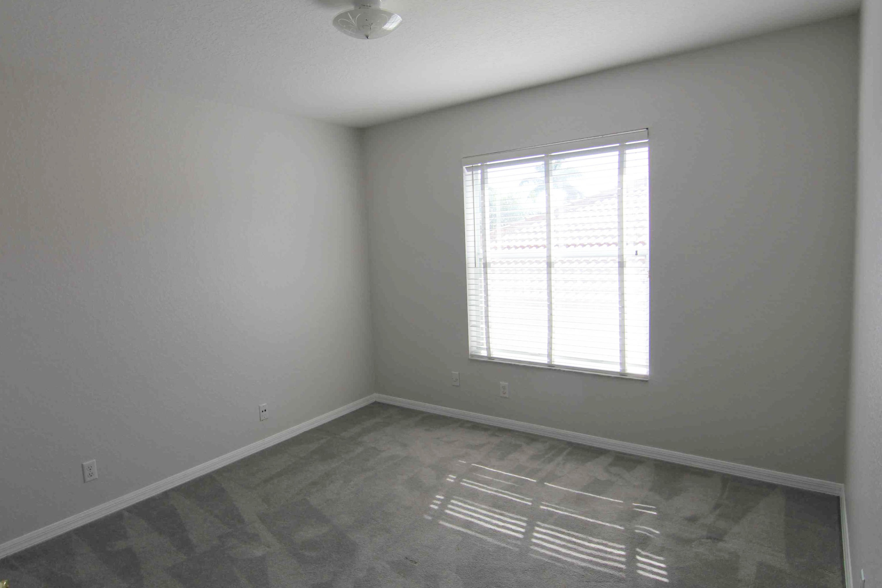 18540 Ocean Mist Drive Boca Raton, FL 33498 - Photo 20 of 37 an empty room with a window