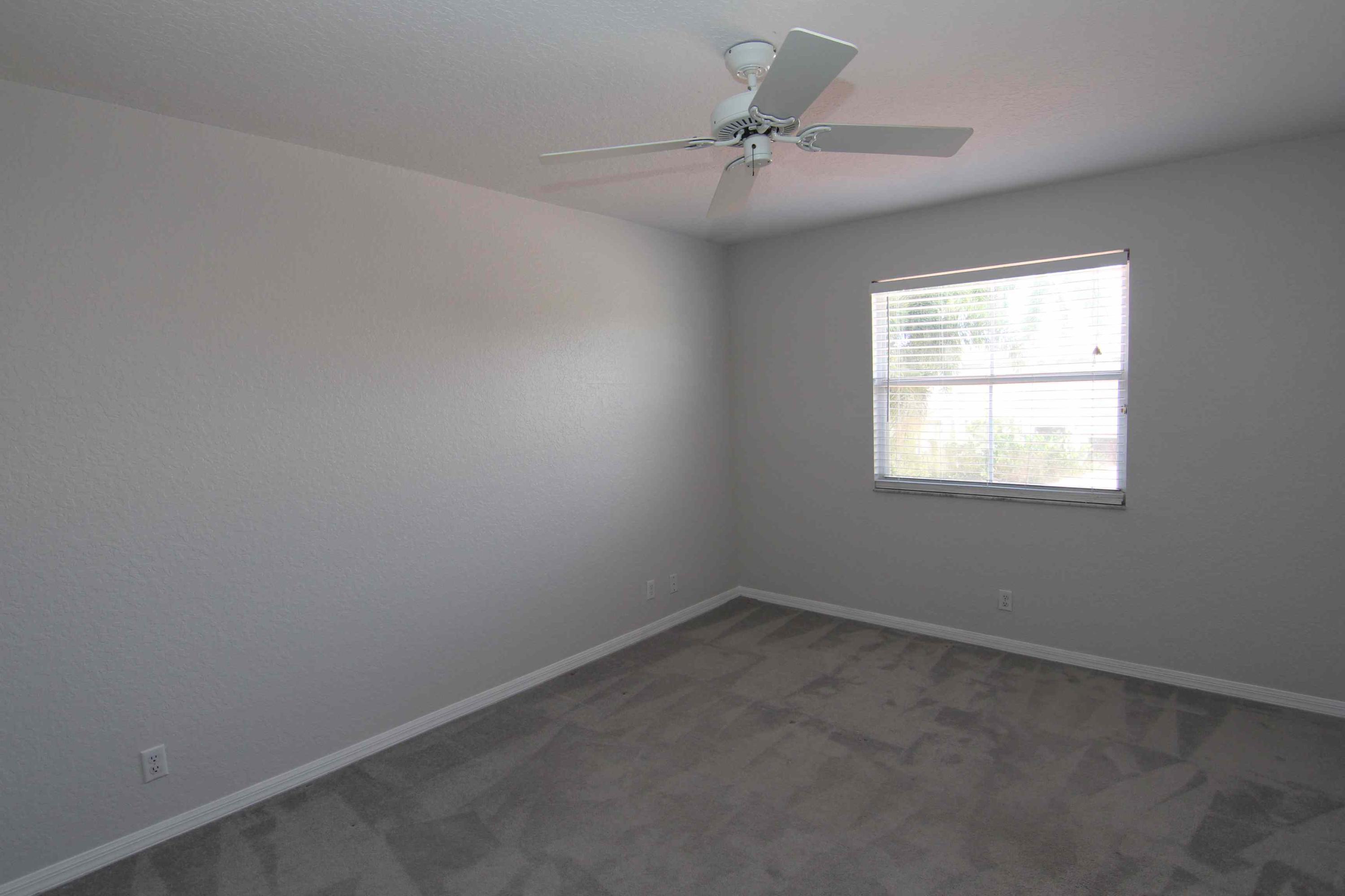 18540 Ocean Mist Drive Boca Raton, FL 33498 - Photo 21 of 37 an empty room with a window
