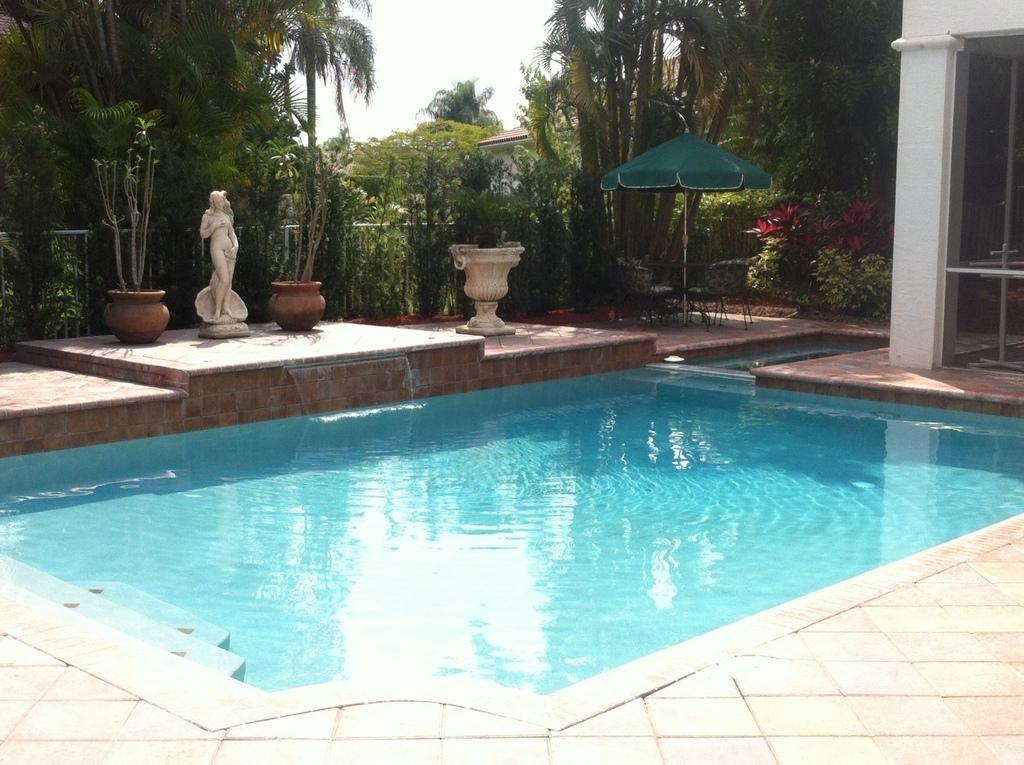 18540 Ocean Mist Drive Boca Raton, FL 33498 - Photo 24 of 37 a view of swimming pool