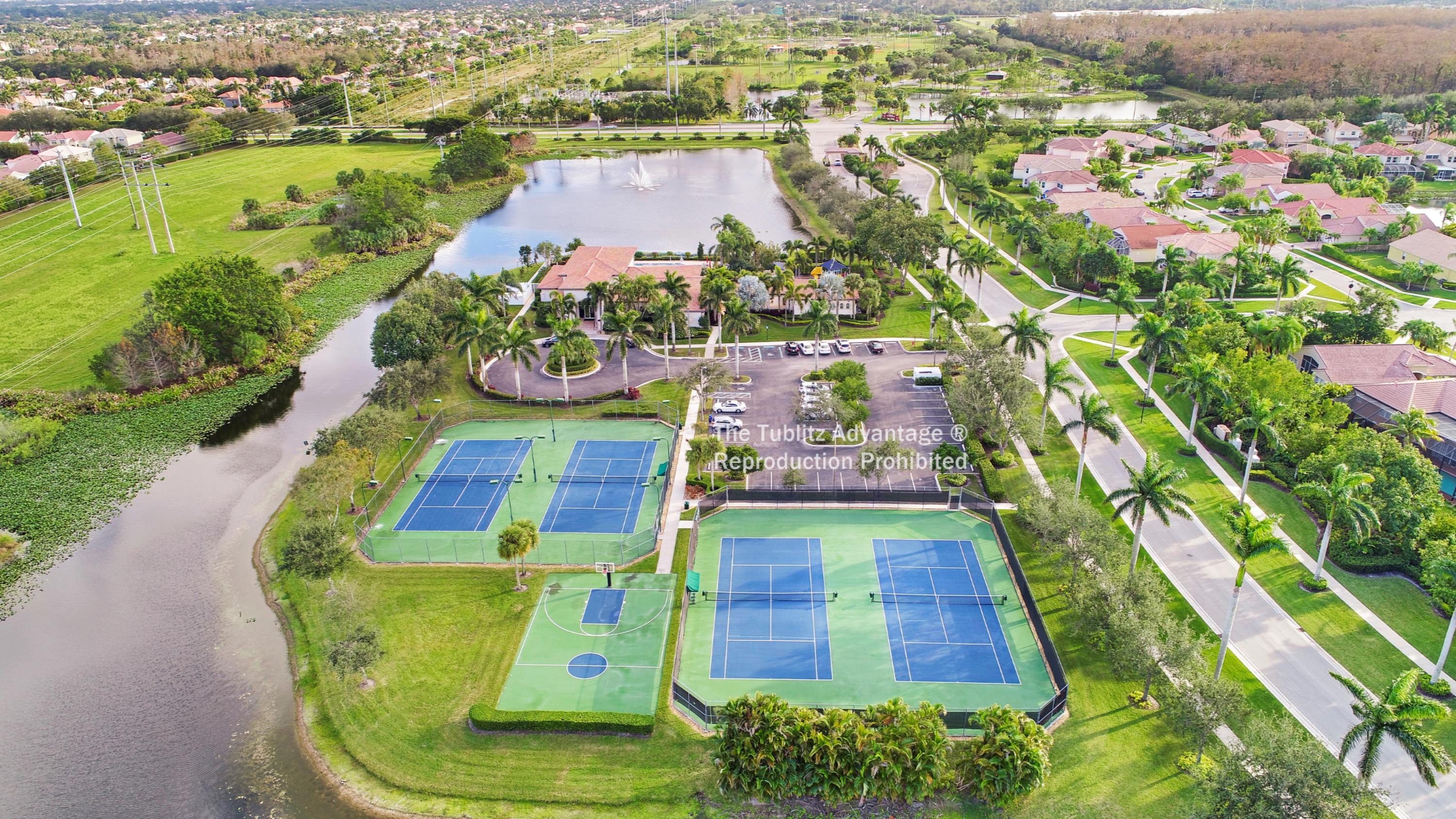 18540 Ocean Mist Drive Boca Raton, FL 33498 - Photo 37 of 37 an aerial view of residential houses with outdoor space and swimming pool