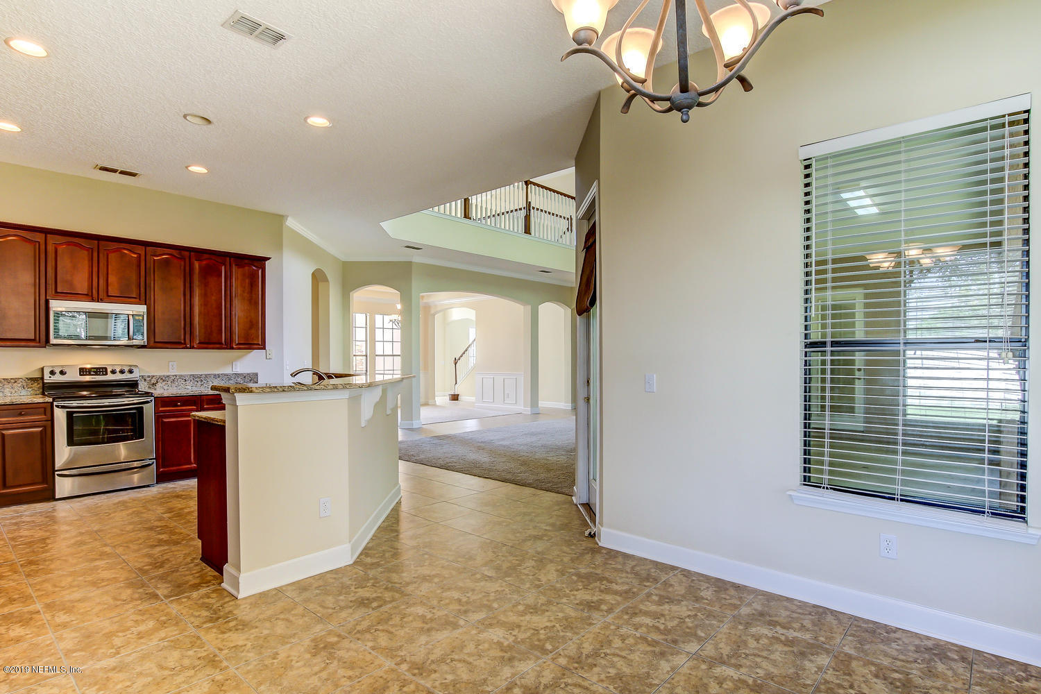 3993 Reds Gait Lane Jacksonville, FL 32223 - Photo 29 of 72 Nook to Kitchen