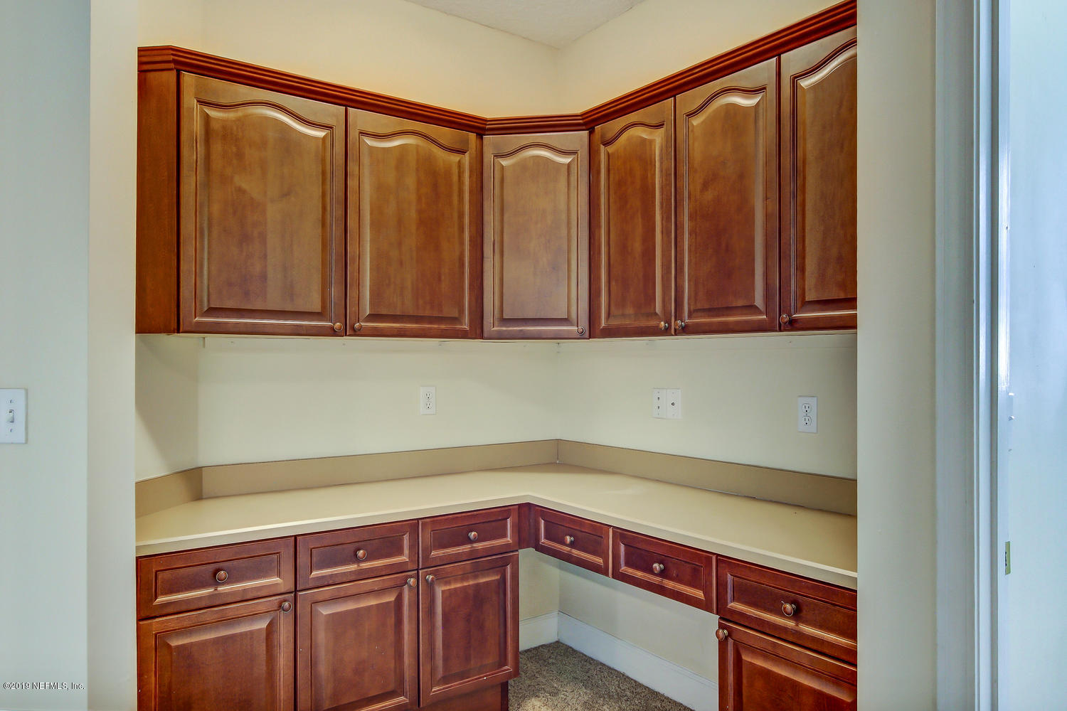 3993 Reds Gait Lane Jacksonville, FL 32223 - Photo 30 of 72 a view of a storage and utility room with wooden floor