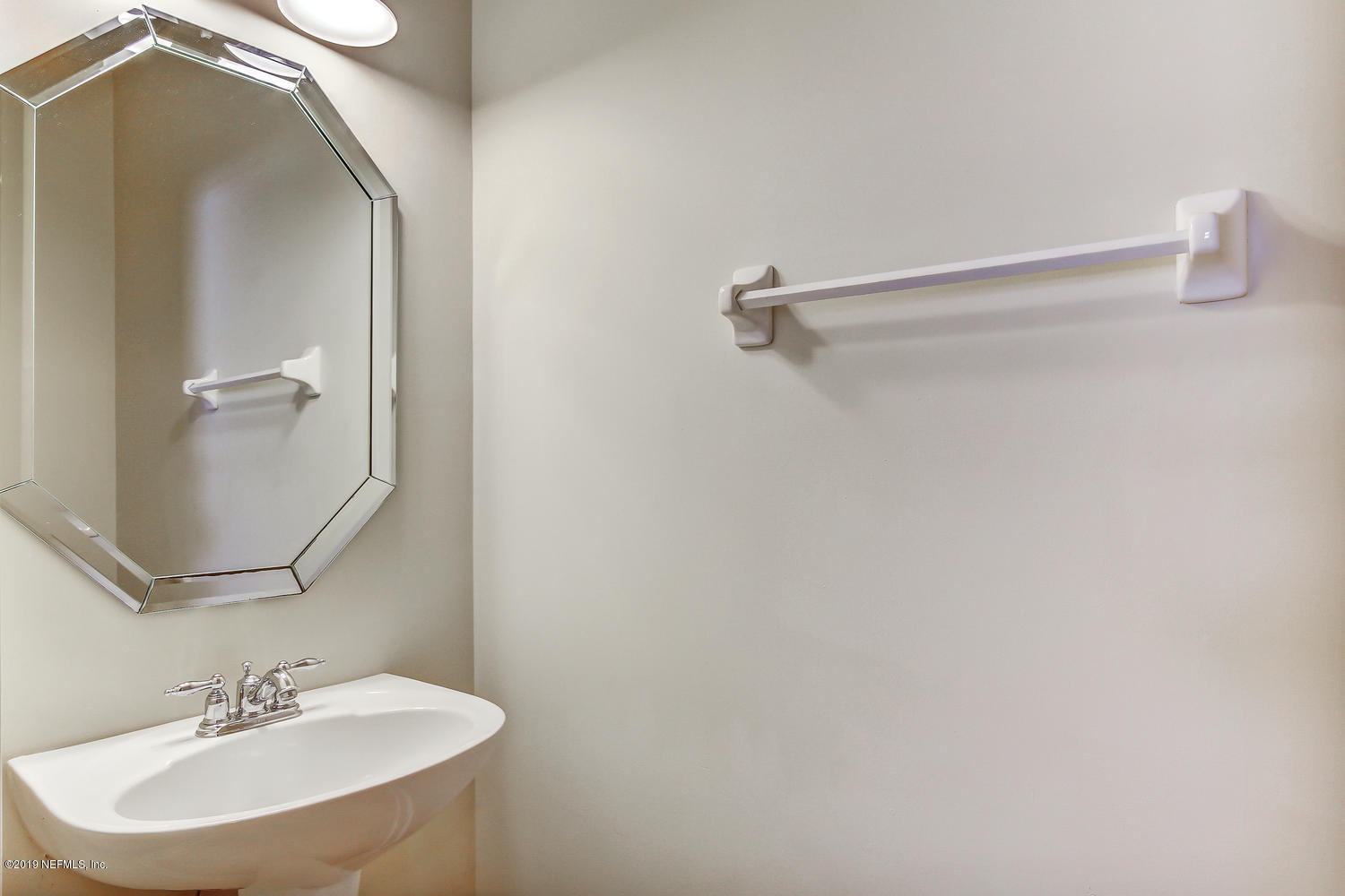 3993 Reds Gait Lane Jacksonville, FL 32223 - Photo 32 of 72 a bathroom with a sink and mirror