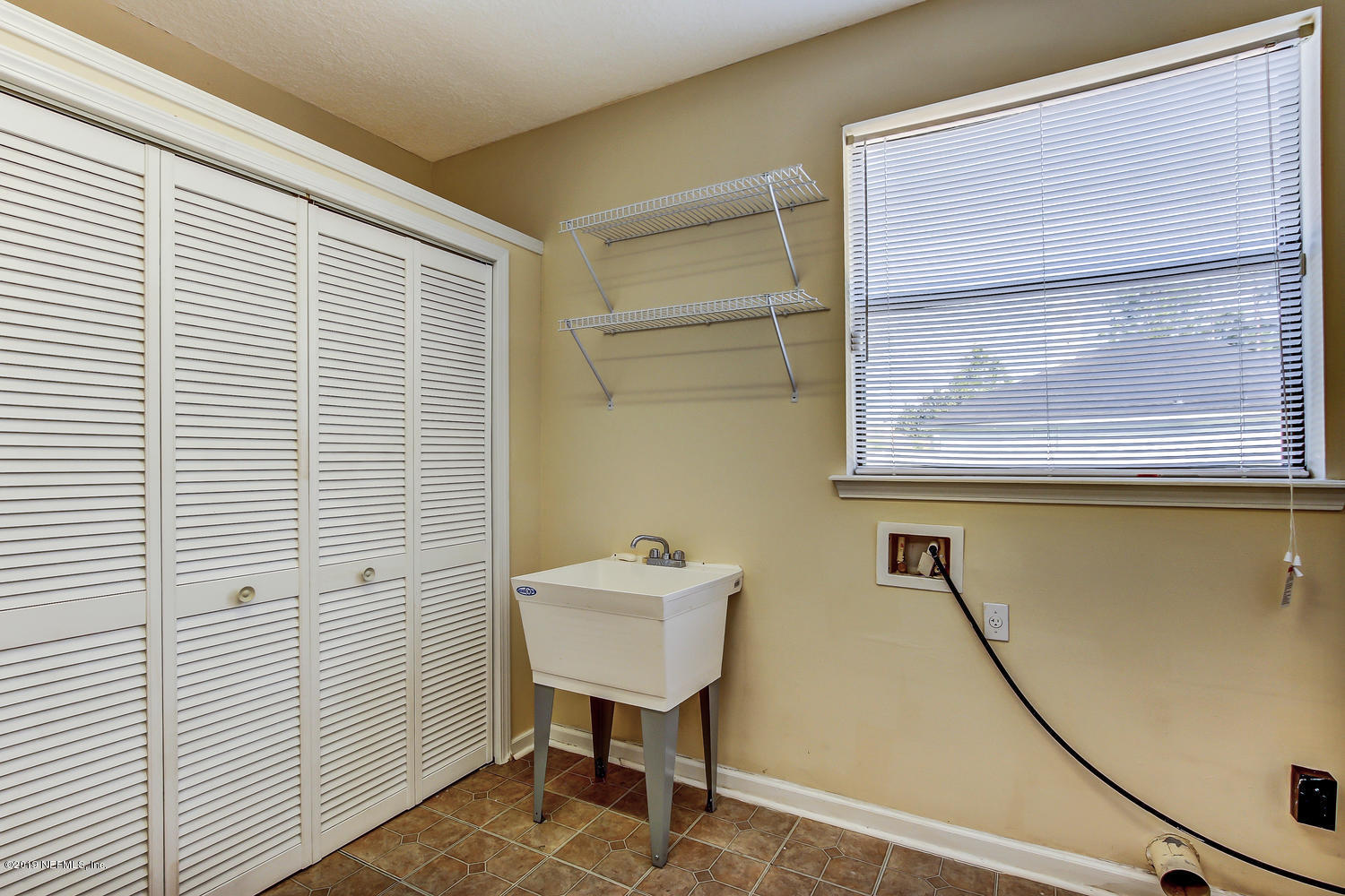 3993 Reds Gait Lane Jacksonville, FL 32223 - Photo 33 of 72 1st-Floor Laundry w/Storage & Sink