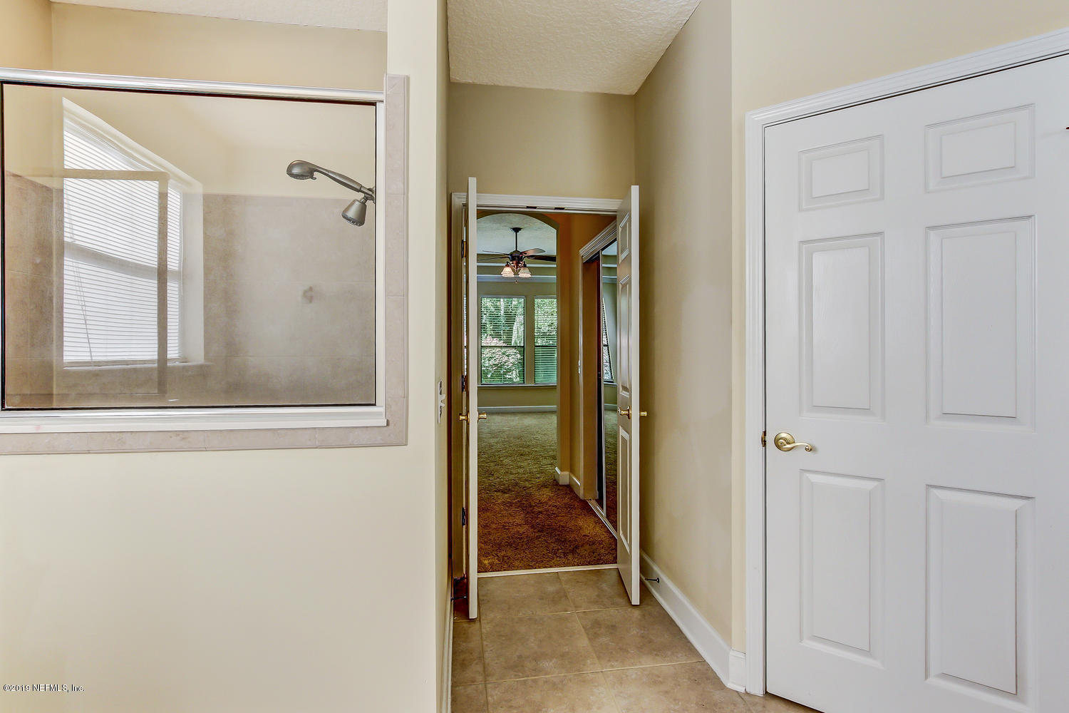 3993 Reds Gait Lane Jacksonville, FL 32223 - Photo 39 of 72 view of a bathroom from a glass door
