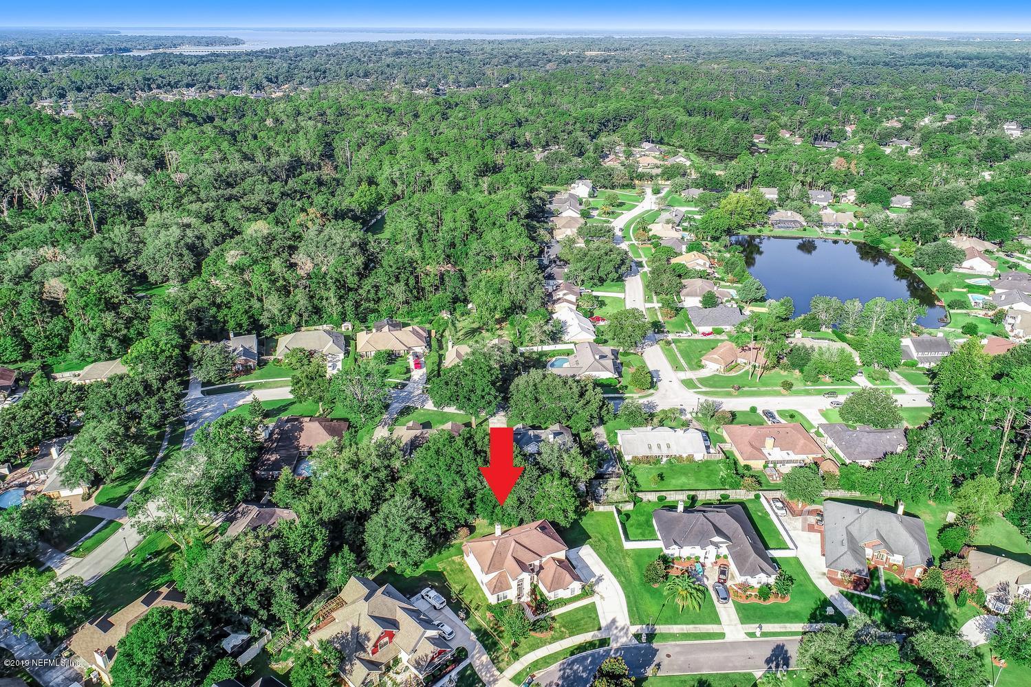 3993 Reds Gait Lane Jacksonville, FL 32223 - Photo 4 of 72 an aerial view of residential houses with outdoor space and trees