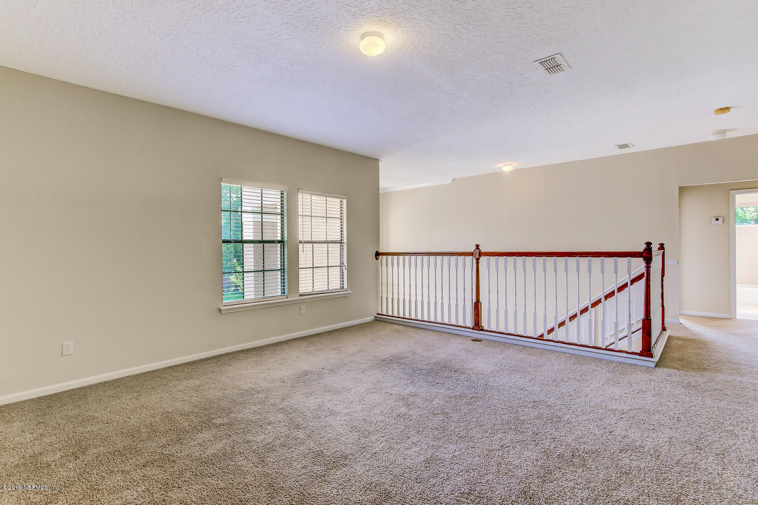 3993 Reds Gait Lane Jacksonville, FL 32223 - Photo 42 of 72 a view of an empty room with a window
