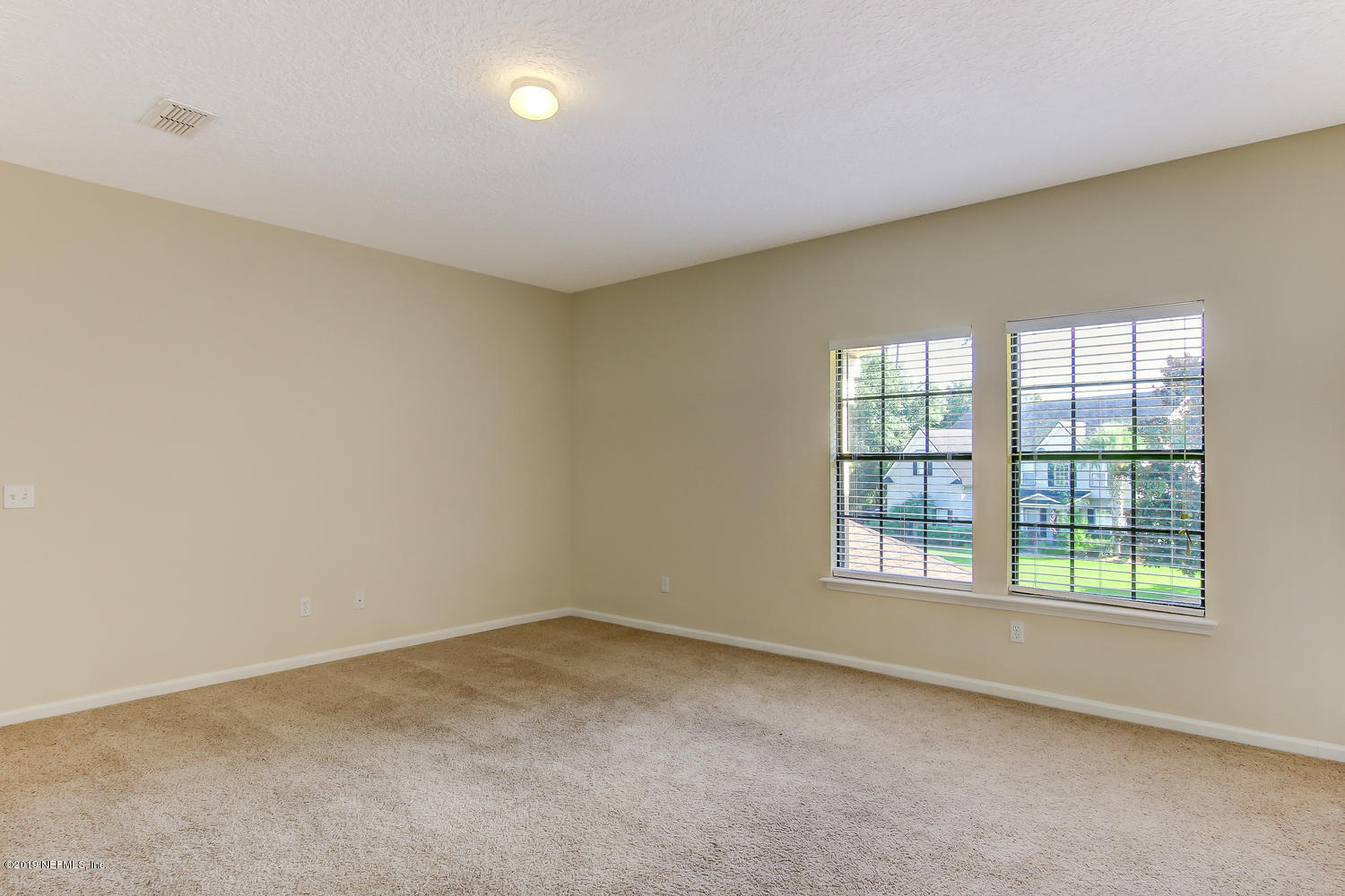 3993 Reds Gait Lane Jacksonville, FL 32223 - Photo 43 of 72 an empty room with a window