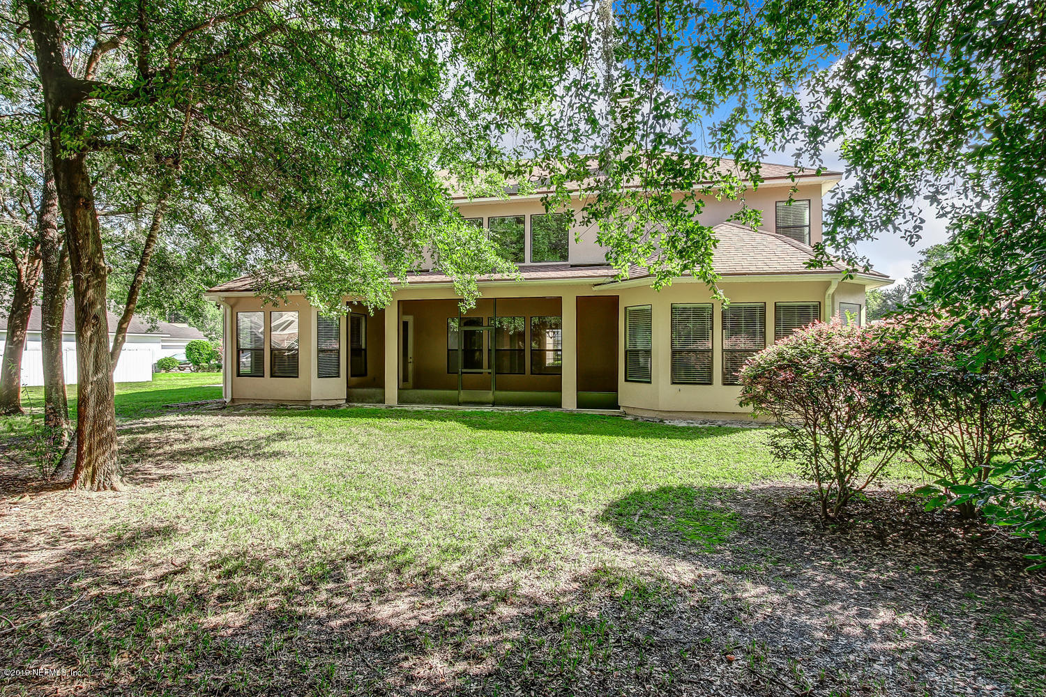 3993 Reds Gait Lane Jacksonville, FL 32223 - Photo 61 of 72 front view of a house with a garden