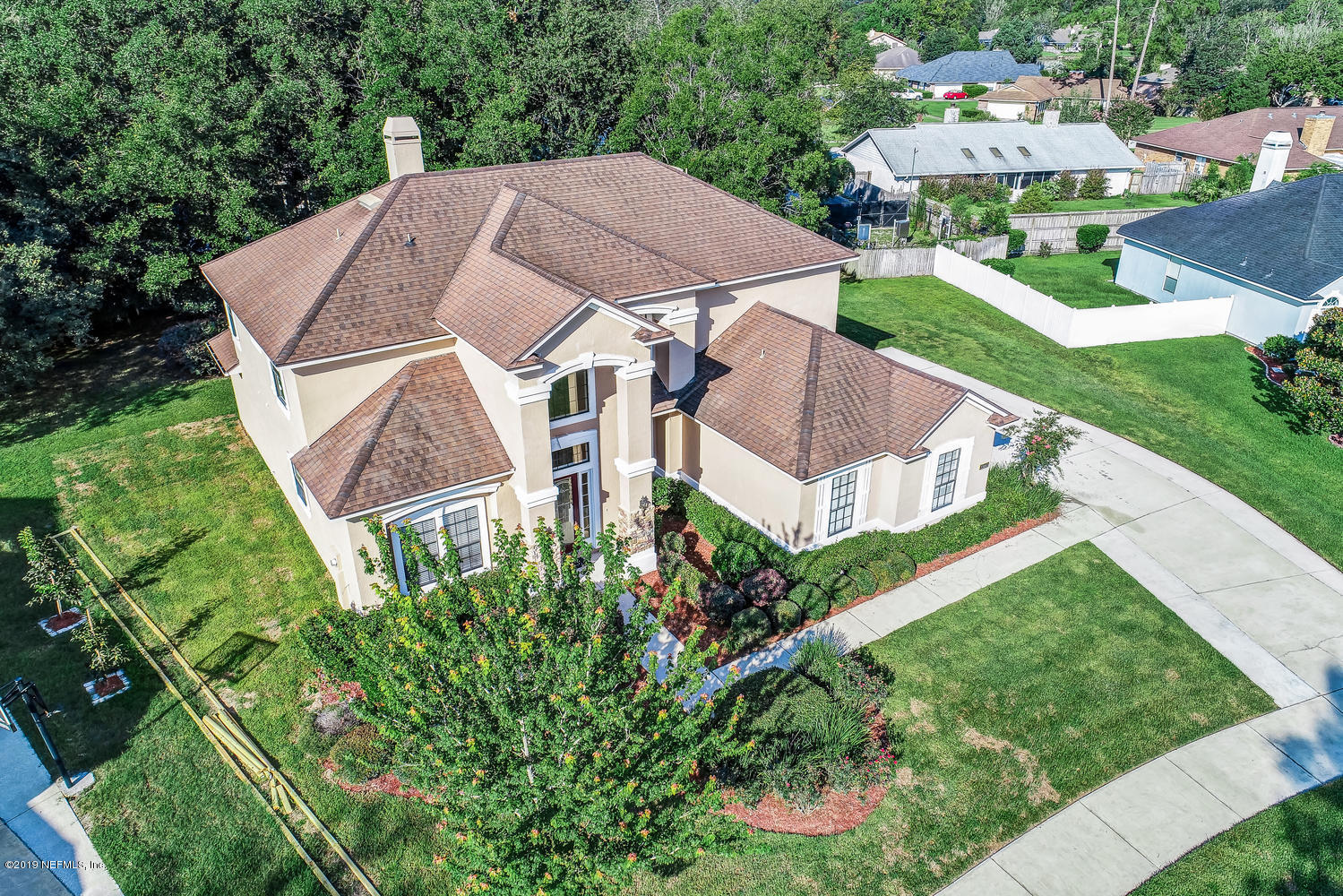 3993 Reds Gait Lane Jacksonville, FL 32223 - Photo 71 of 72 an aerial view of a house with garden space and street view