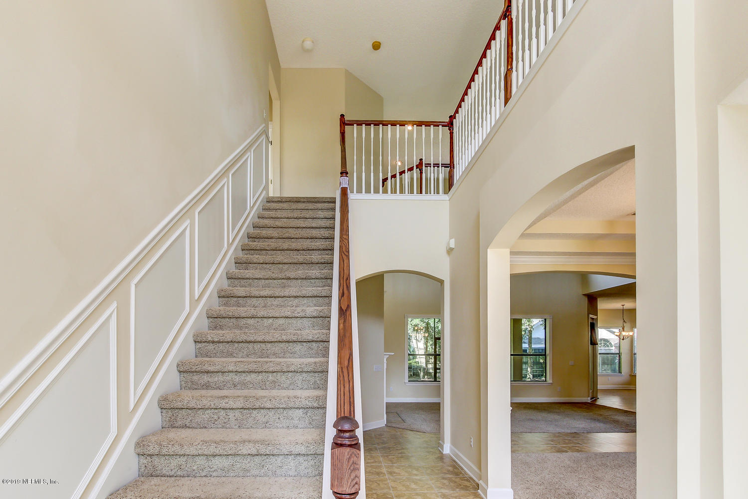 3993 Reds Gait Lane Jacksonville, FL 32223 - Photo 8 of 72 a view of entryway and hall with wooden floor