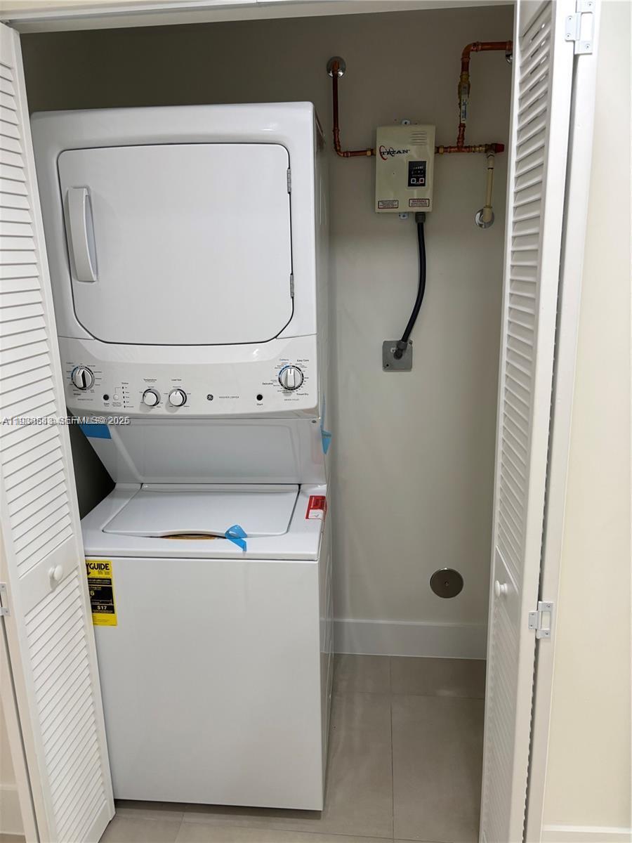 310 East 7th Street, Unit 202 Hialeah, FL 33010 - Photo 13 of 13 a utility room with dryer and washer