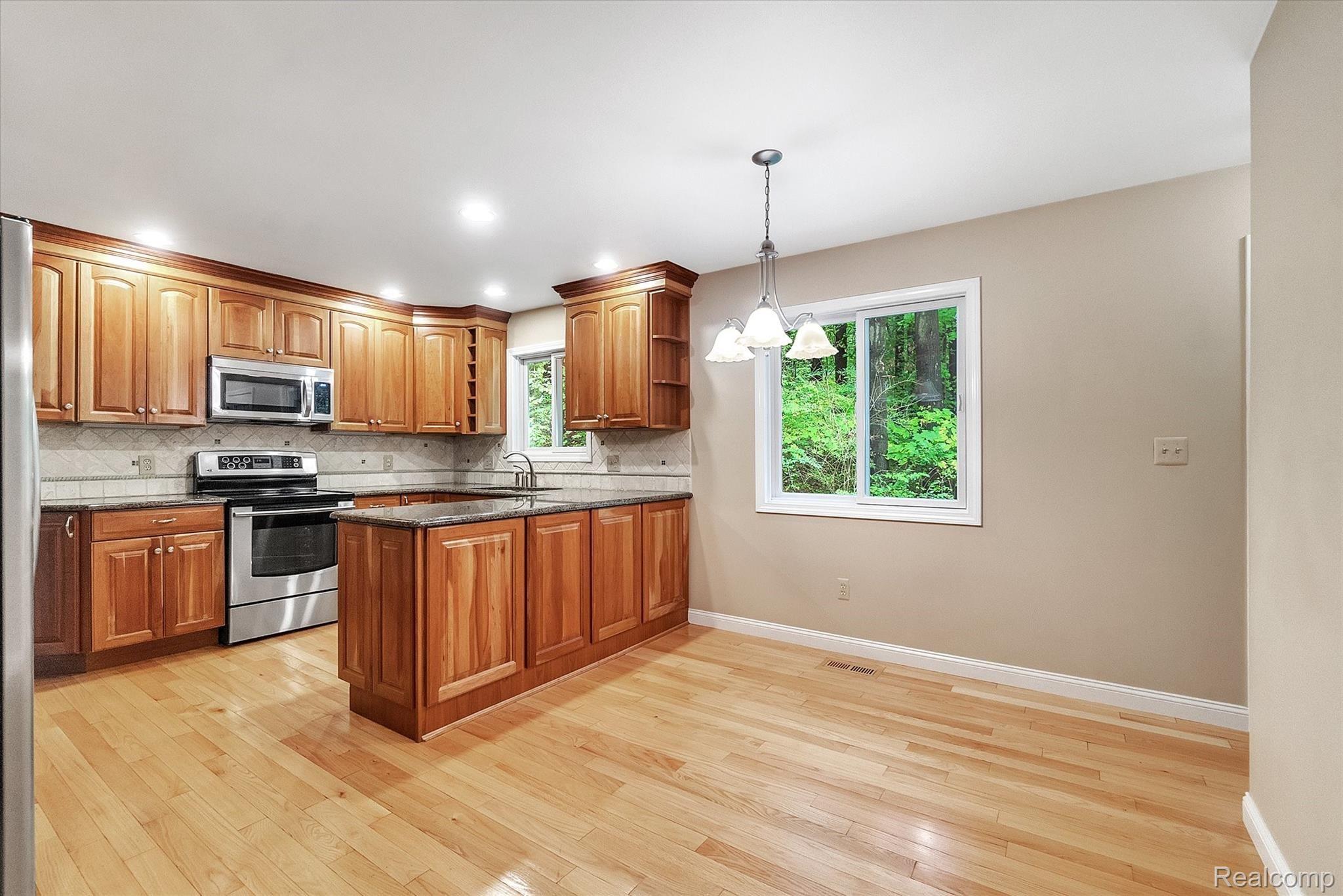 3335 Jewell Road Howell, MI 48843 - Photo 11 of 32 11-Updated Kitchen and wood floor-Appliances included with house
