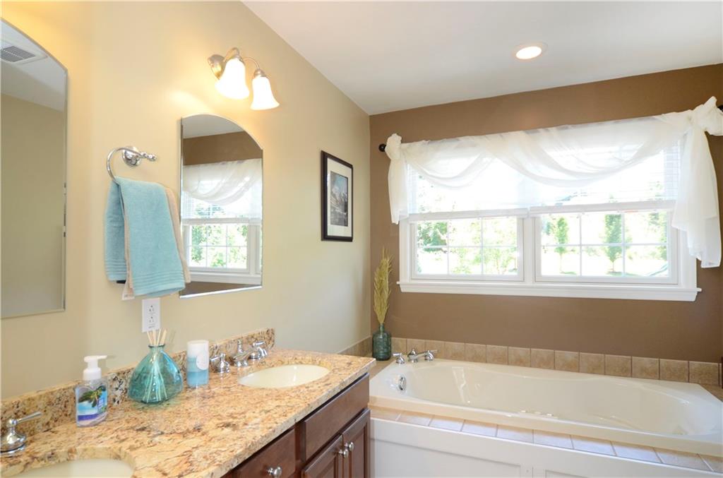 5007 Oak Point Drive McKees Rocks, PA 15136 - Photo 13 of 24 Master BathGranite counter top, jet tub and tile floor