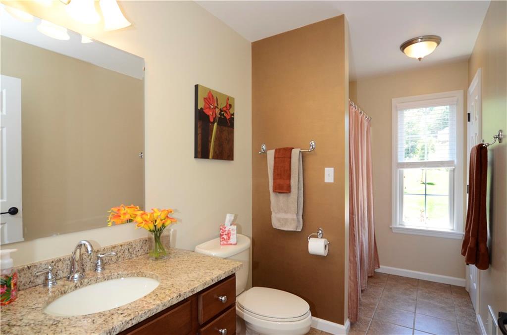 5007 Oak Point Drive McKees Rocks, PA 15136 - Photo 17 of 24 Main BathroomGranite Counters and Tile Flooring