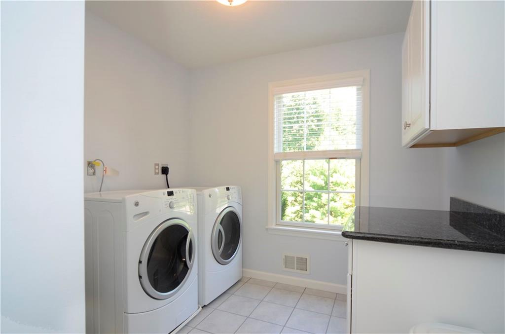 5007 Oak Point Drive McKees Rocks, PA 15136 - Photo 18 of 24 First-Floor Laundry with Granite Counters