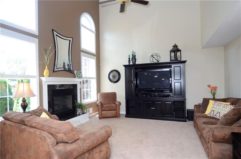 5007 Oak Point Drive McKees Rocks, PA 15136 - Photo 10 of 24 Two Story Family RoomGas Fireplace flanked by double stacked windows
