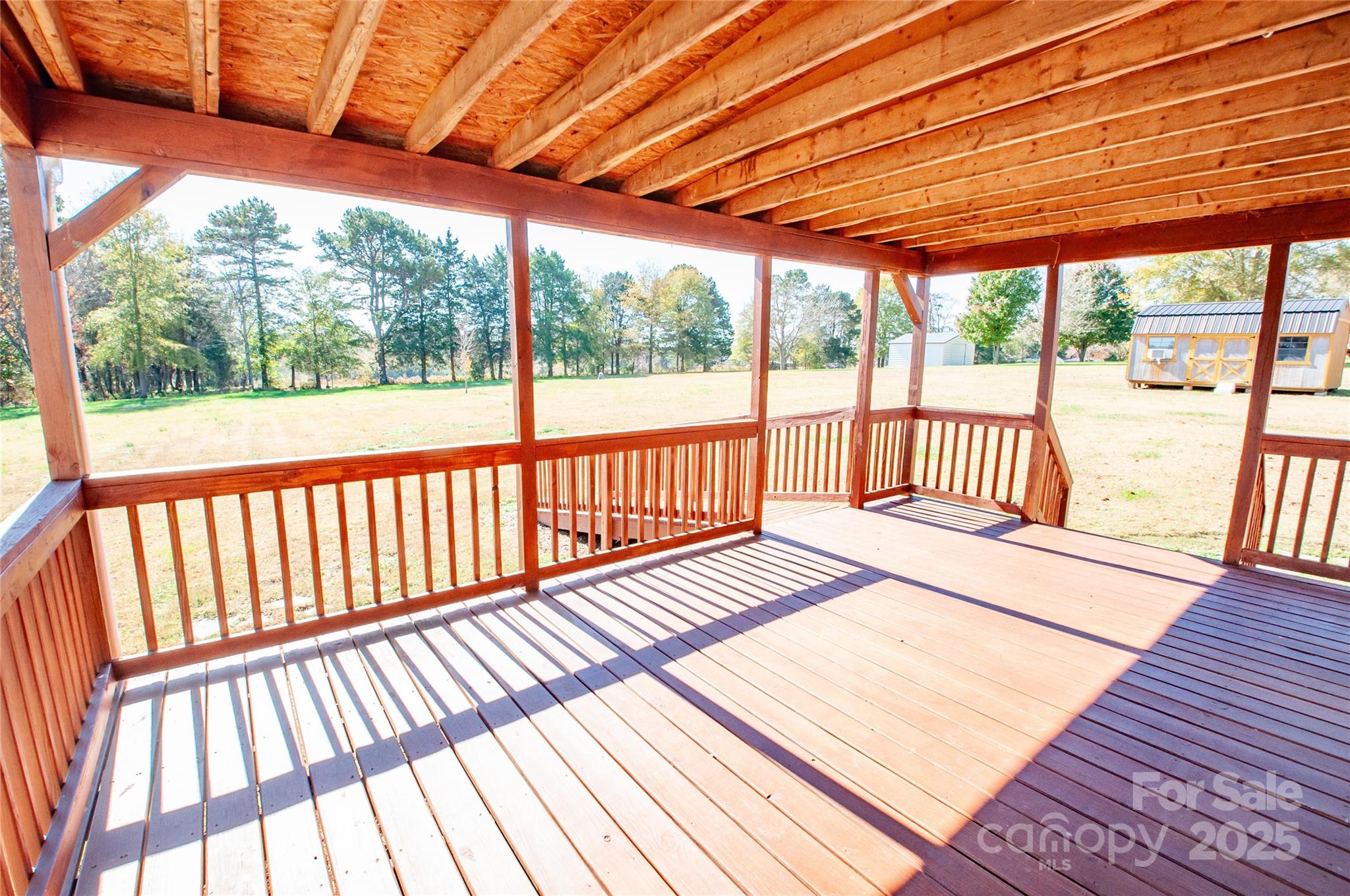 182 Red Hawk Lane Olin, NC 28660 - Photo 12 of 14 a view of balcony with wooden floor