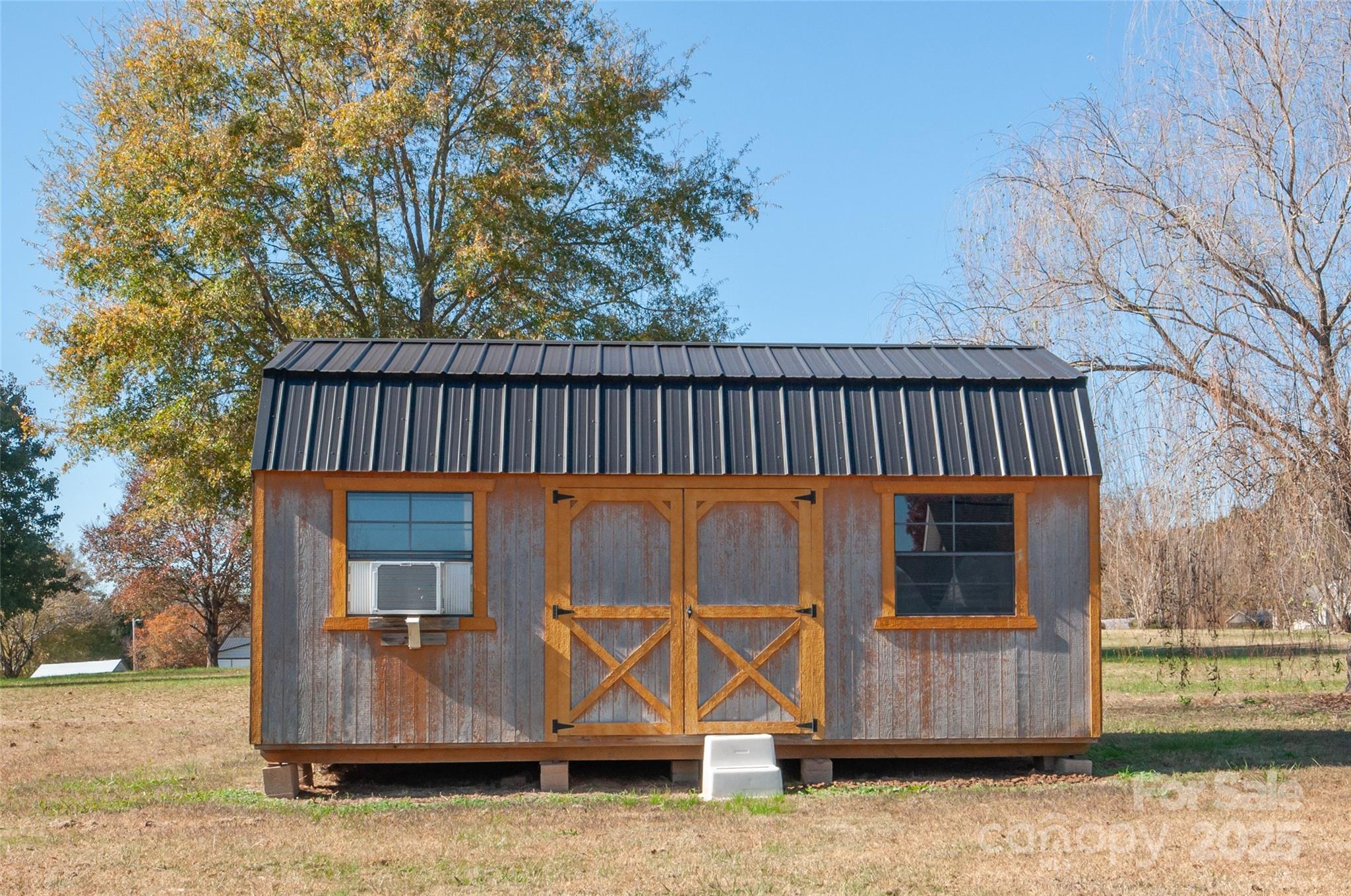 182 Red Hawk Lane Olin, NC 28660 - Photo 14 of 14 a view of outdoor space with wooden fence