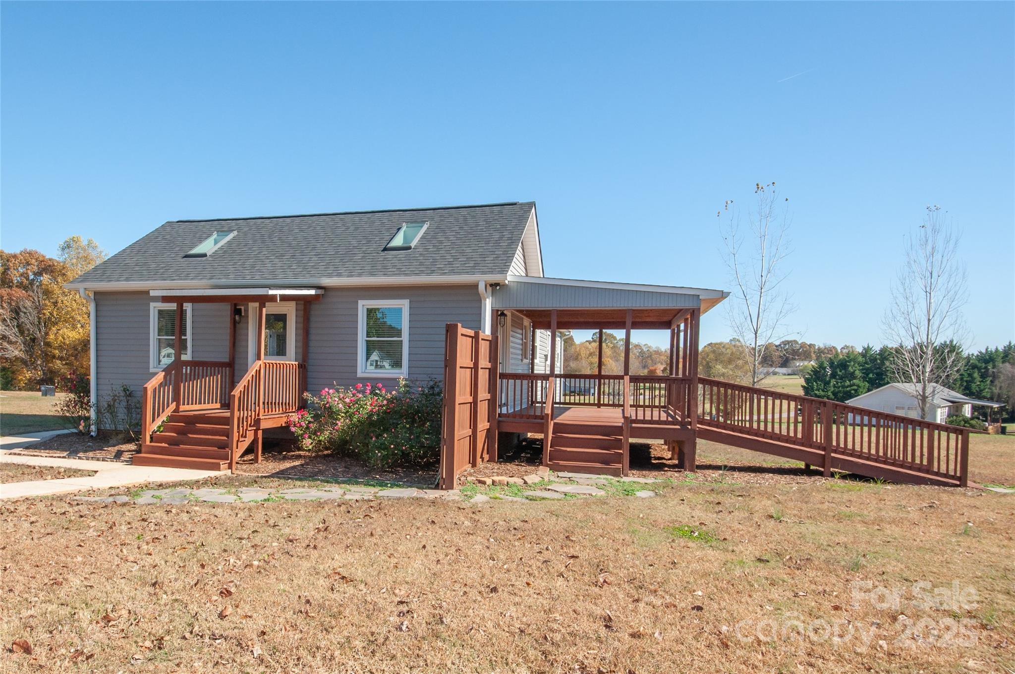 182 Red Hawk Lane Olin, NC 28660 - Photo 3 of 14 a front view of house with yard