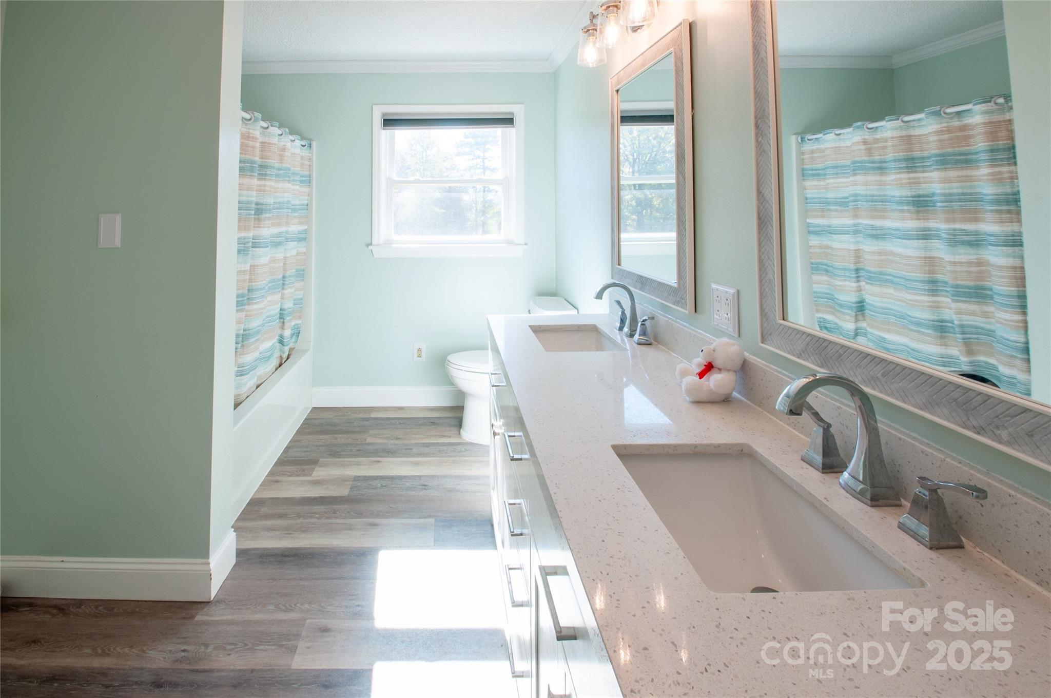 182 Red Hawk Lane Olin, NC 28660 - Photo 7 of 14 a bathroom with a sink and a bathtub