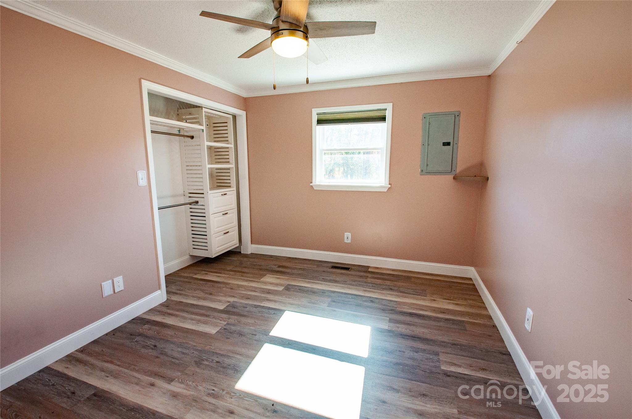 182 Red Hawk Lane Olin, NC 28660 - Photo 8 of 14 wooden floor in an empty room with a window