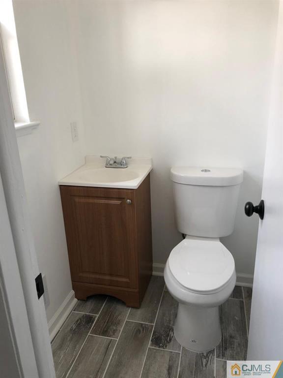 902 Salem Road Burlington, NJ 08016 - Photo 10 of 17 a bathroom with a toilet and a sink
