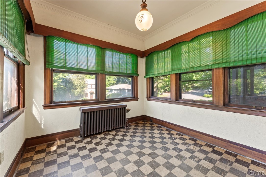 303 Barrington Road, Unit 5 Syracuse, NY 13214 - Photo 7 of 44 Heated sunroom off of the living room