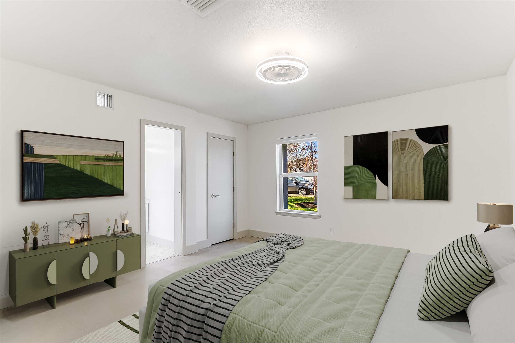 10101 Rutland Village East Austin, TX 78758 - Photo 13 of 26 Large primary bedroom with walk in closet, polished concrete floors and stylish en-suite bath - virtually staged.