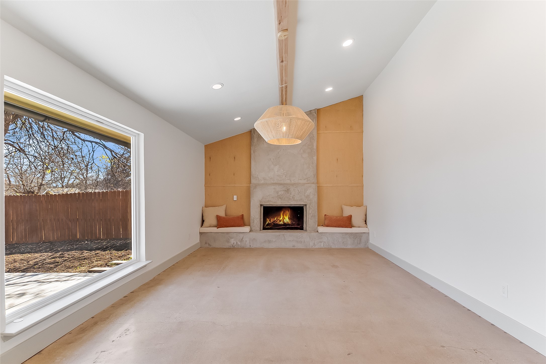 10101 Rutland Village East Austin, TX 78758 - Photo 7 of 26 Family room with beautiful fireplace and 6 ft x 6 ft picture window looking out to the backyard