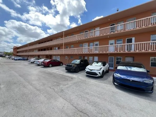 a car parked in front of a building