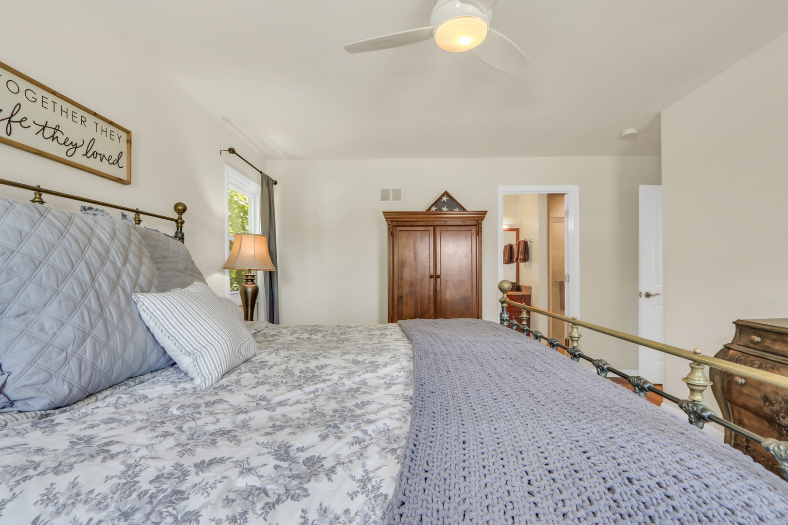 1215 Devonshire Road Buffalo Grove, IL 60089 - Photo 20 of 36 a view of a bedroom with bed and dresser