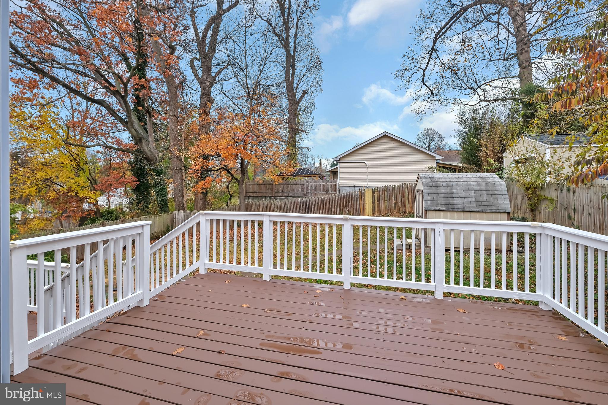 4205 Ferrara Drive Silver Spring, MD 20906 - Photo 29 of 38 a view of a wooden roof deck