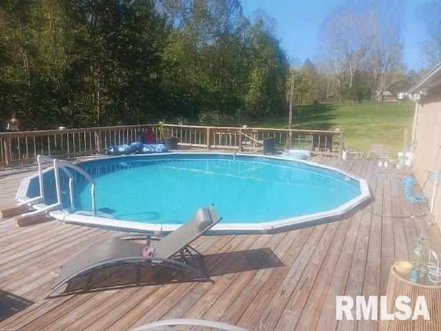 22145 Old Delta Mine Road Marion, IL 62959 - Photo 18 of 26 a view of a swimming pool with a patio
