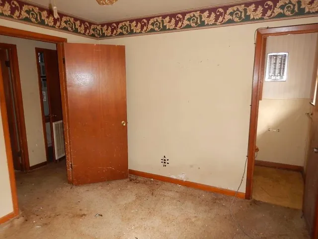 a view of a hallway with closet