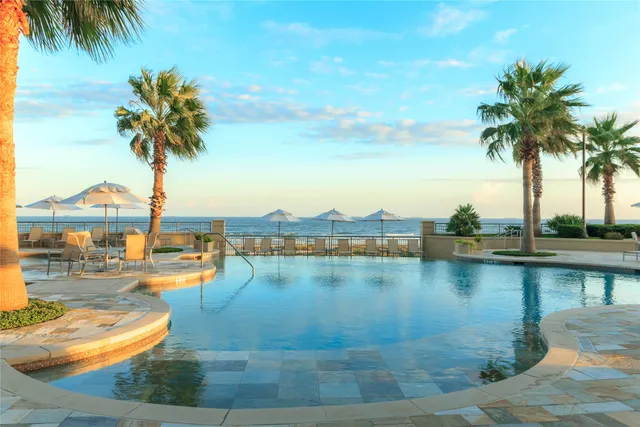a view of a lake with a building and a water view