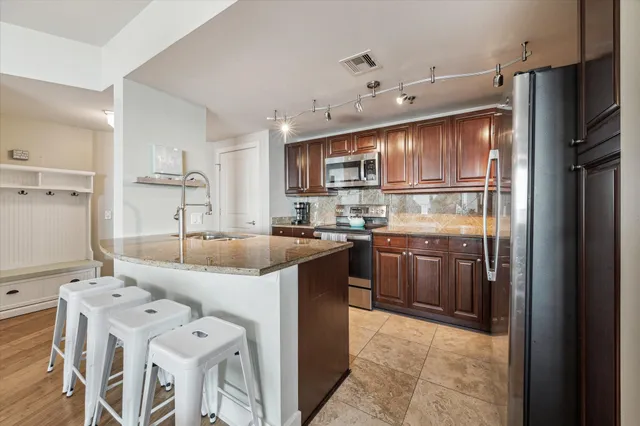 a bed room with a bed and a large window