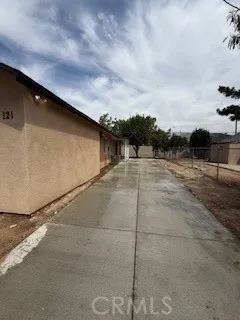 a view of an outdoor space and tennis court