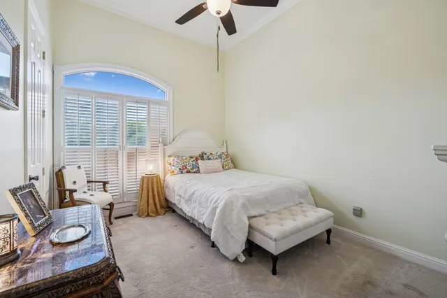 a view of a backyard and swimming pool