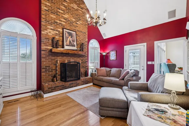 a kitchen with stainless steel appliances granite countertop a stove and a wooden cabinets