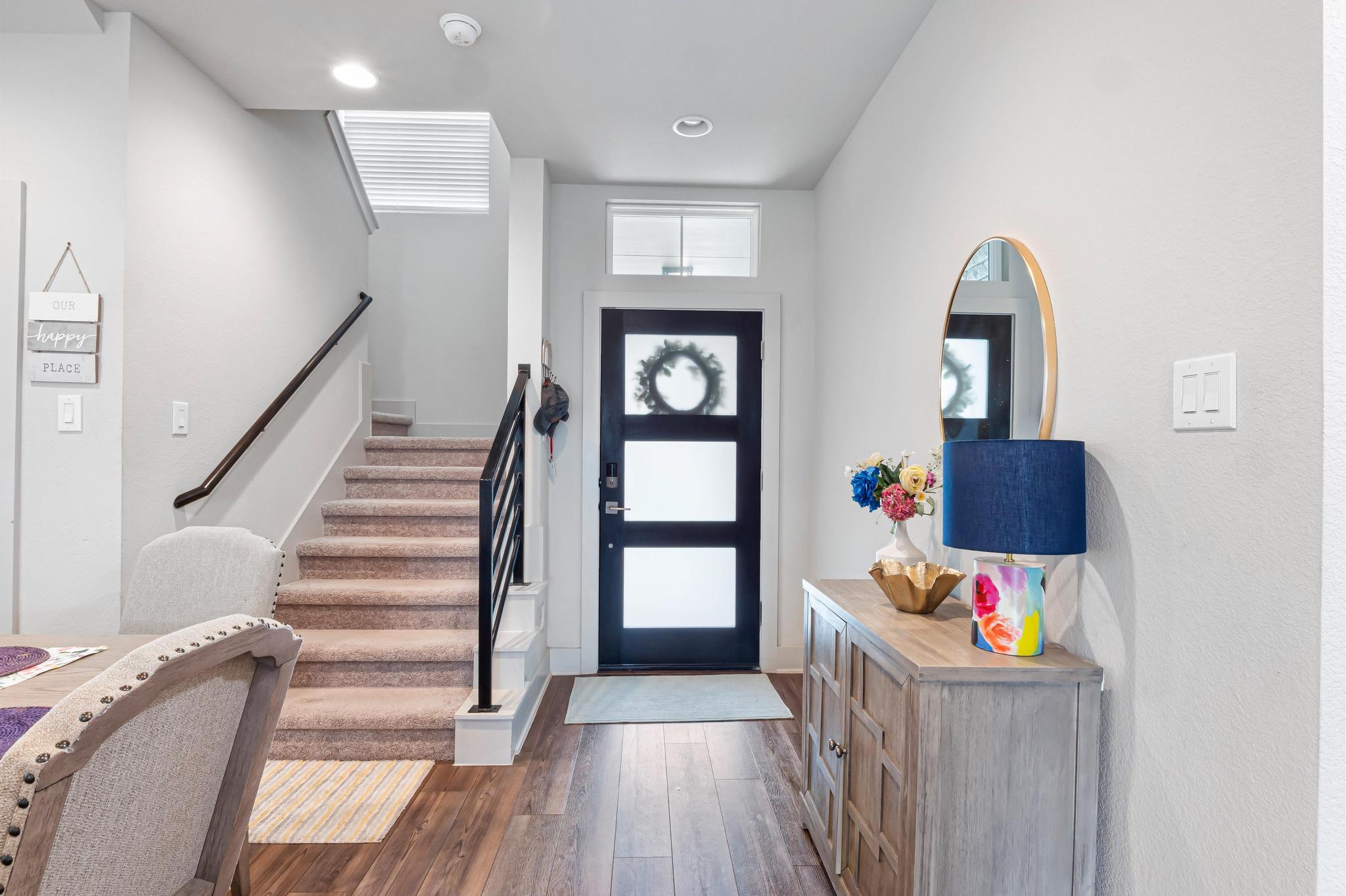 2301 Local Rebel Street Leander, TX 78641 - Photo 6 of 21 a view of entryway with stairs and wooden floor